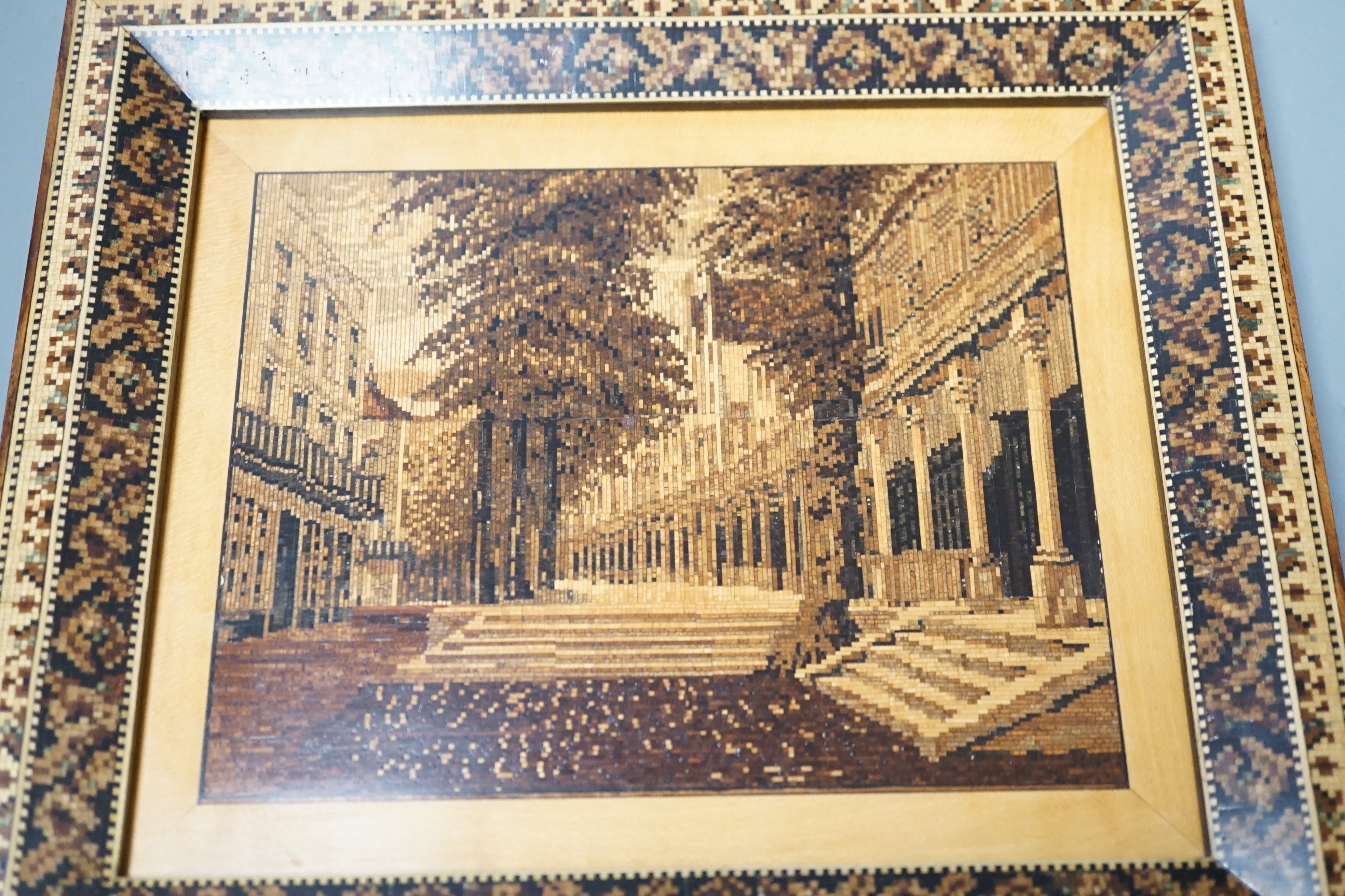 A Tunbridge ware tesserae mosaic picture of the Pantiles, in a mosaic frame, 20 x 23cm